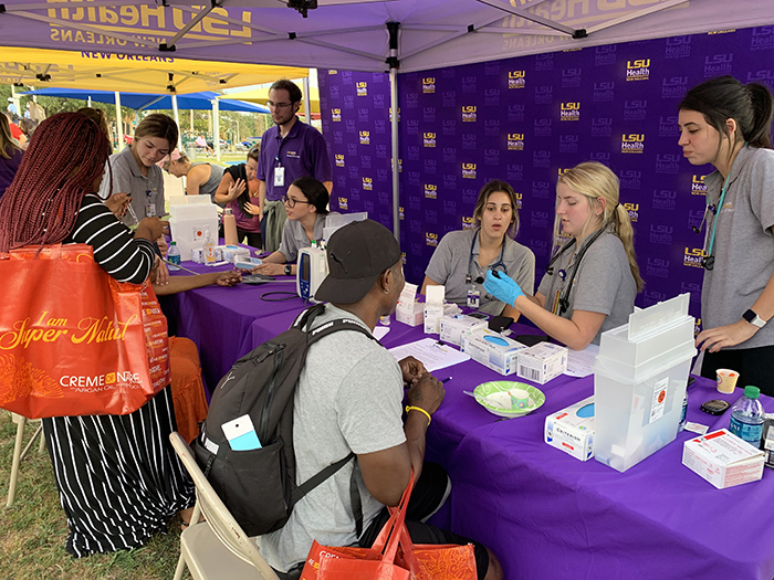 LSU Health nursing students doing health checks at Night Out Against Crime